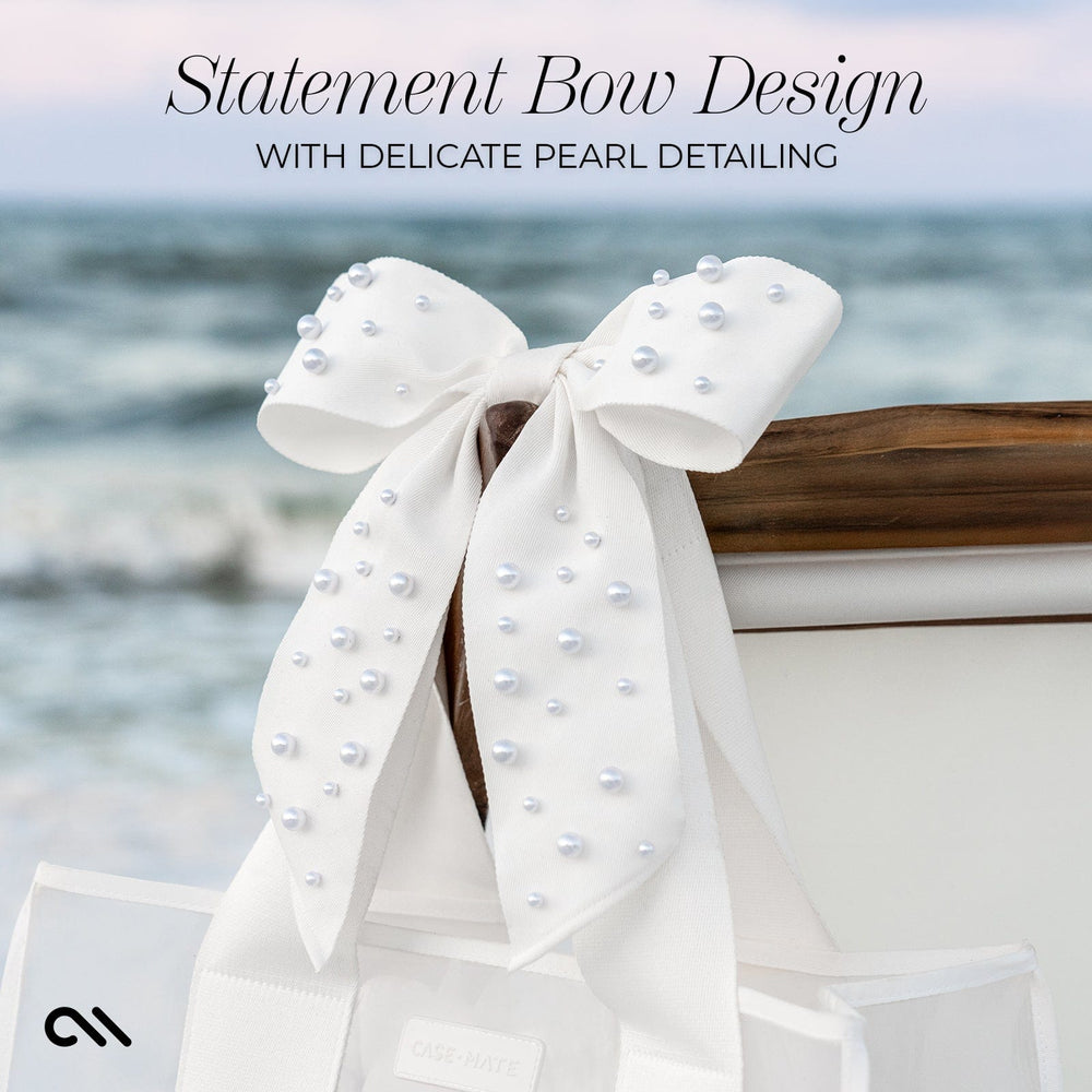 STATEMENT BOW DESIGN WITH DELICATE PEARL DETAILING #color_ivory pearl bow